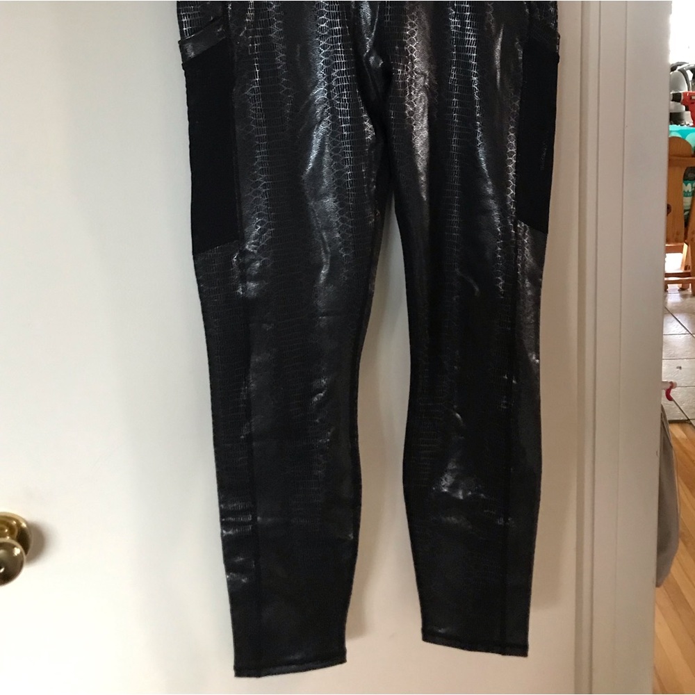 Very nice faux snakeskin leggings with mesh external pocket